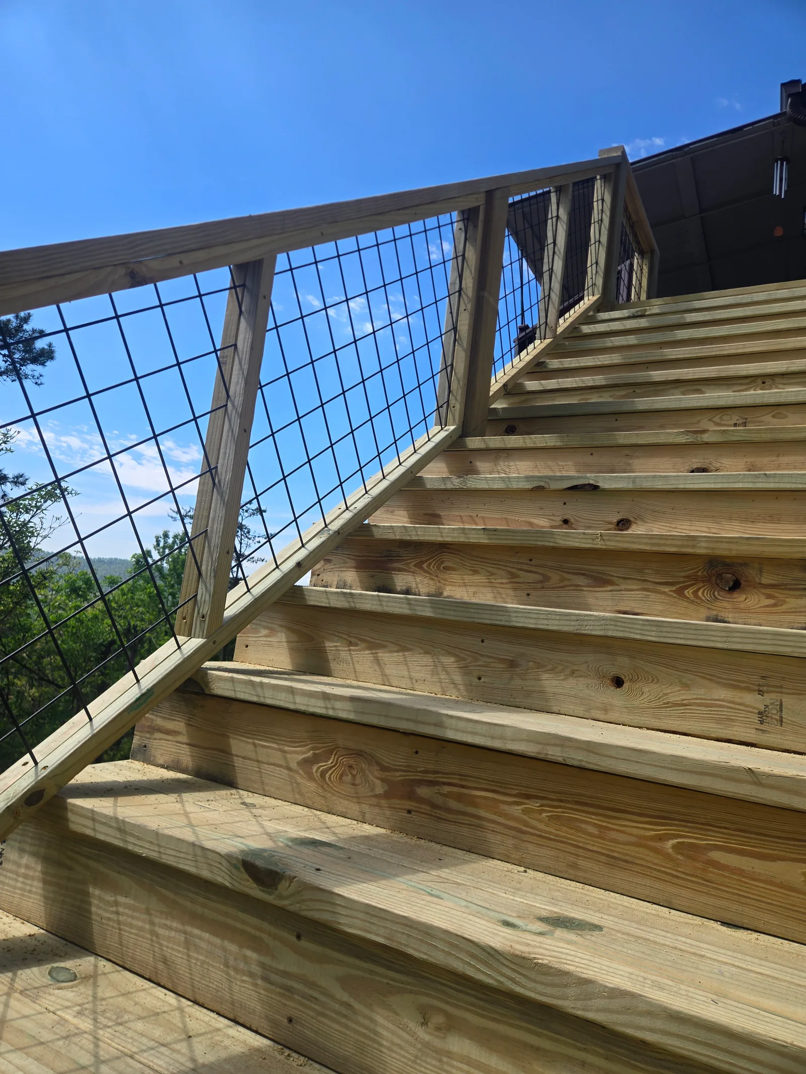 Outdoor stair treads with wire railing panels