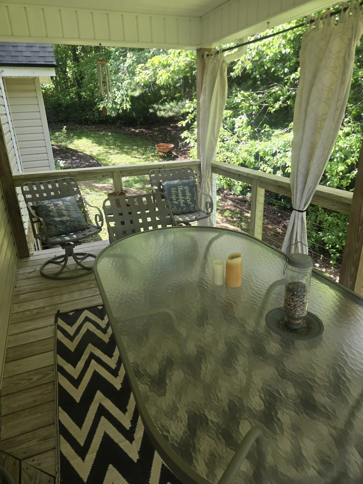 Exterior porch railing after cable rail installation