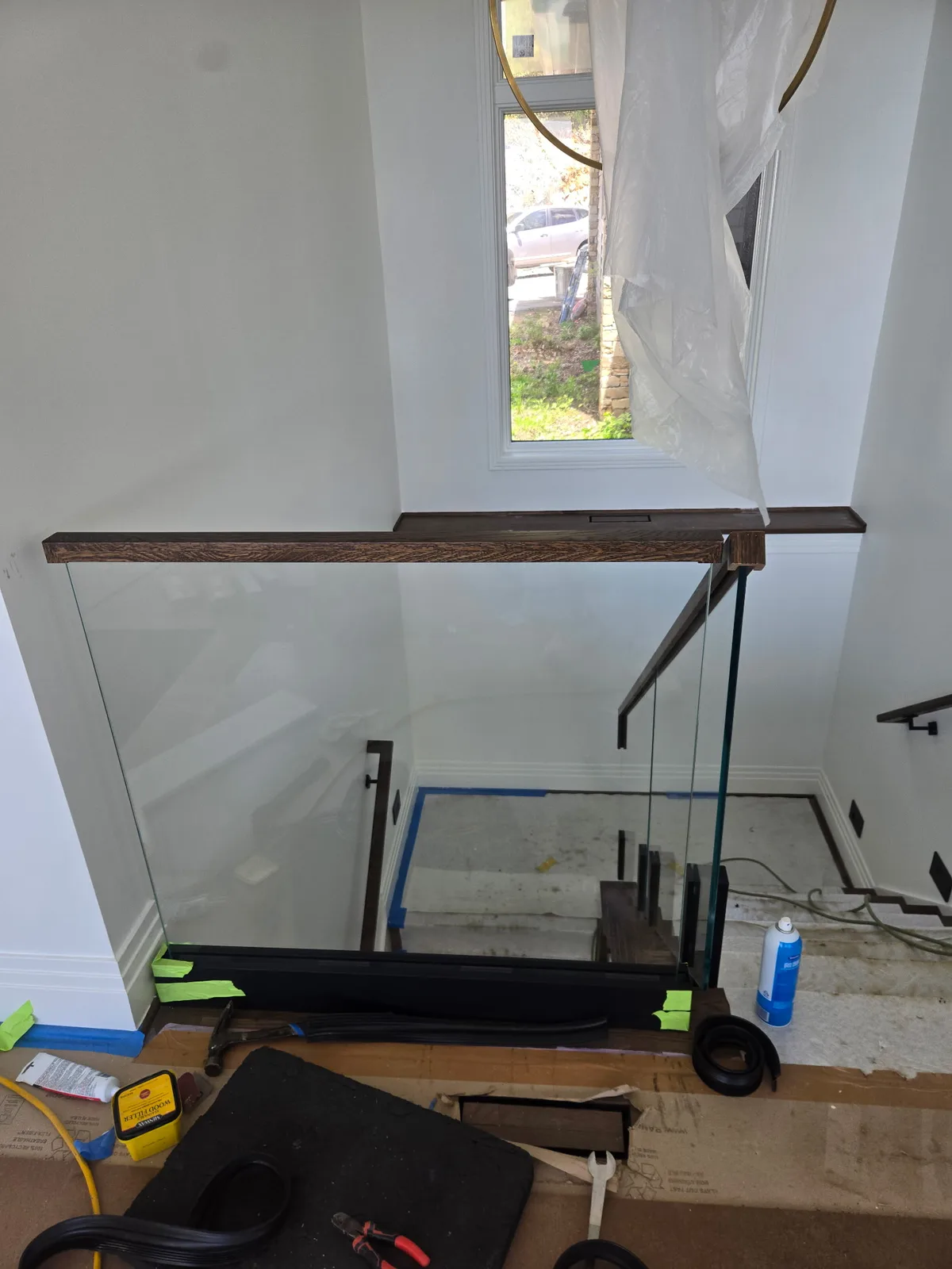 Viewrail glass stair railing installed along a modern staircase